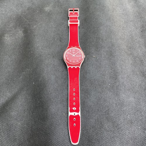 Swatch wristwatch red dial and - red,